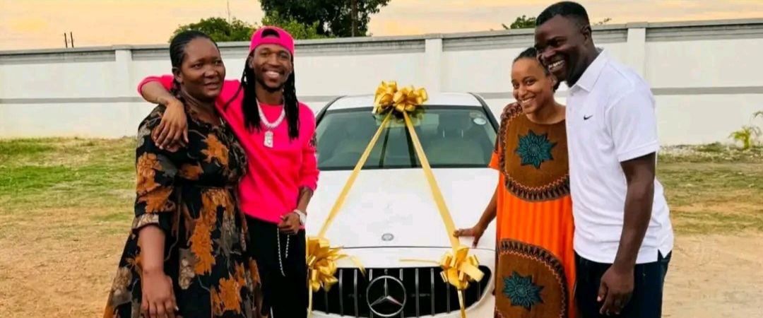 In the picture is Elton Mulenga alias Yo Maps and his wife pictured with Yo Maps' adopting parents Mr and Mrs Mundia being gifted a brand new Mercedes-Benz in 2024